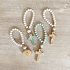 Bitty Blessing Beads® Turquoise Cross