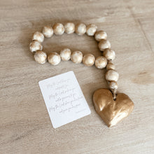  Wooden blessing beads with clay pendant